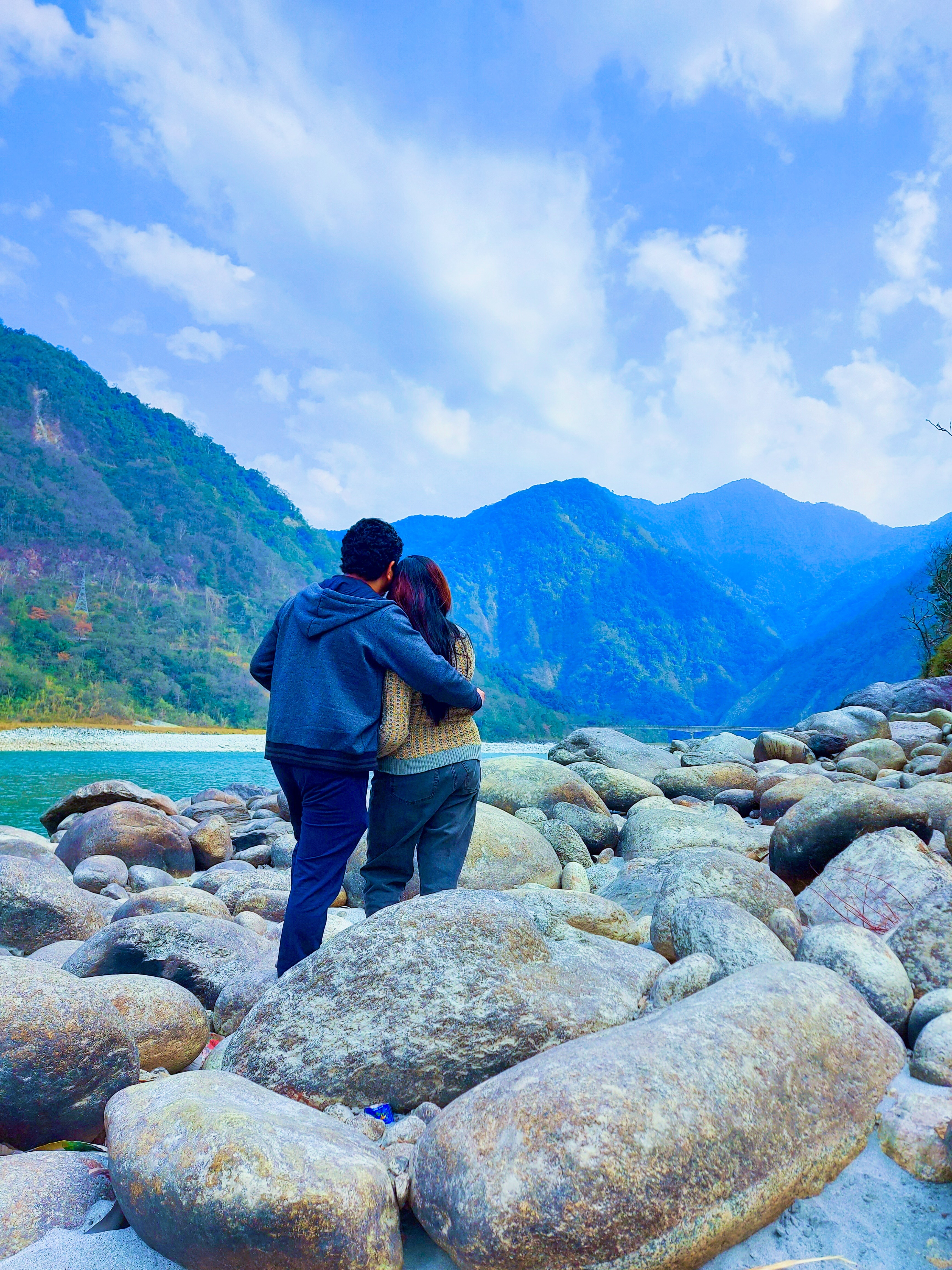 Standing on the boulders by the Siang river in Arunachal Pradesh
